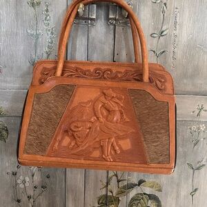 Vintage hand tooled leather bag